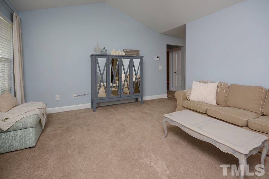 220 Orkney Road Stem, NC 27581 - Photo 4 of 18 a living room with furniture and a couch