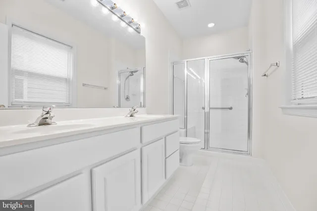 a view of a room with wooden walls