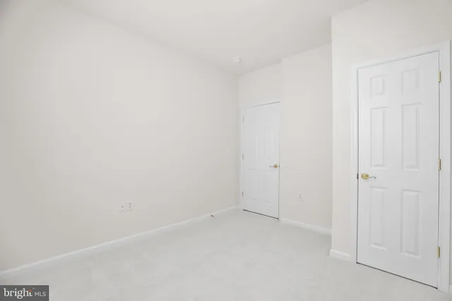 a view of a house with a yard and garage