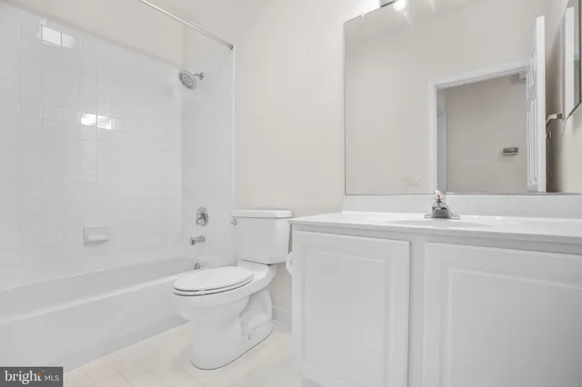 a house with a tree in front of it