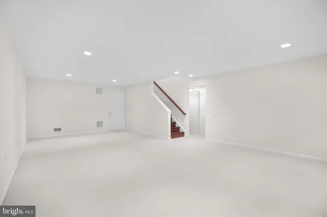 a view of a porch with wooden floor