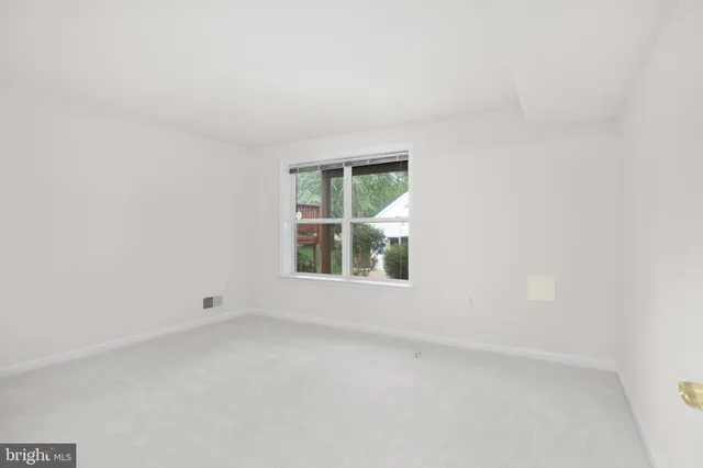 a view of a backyard of the house