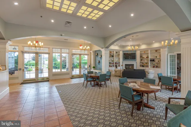 a view of a city with flower garden in front of the house