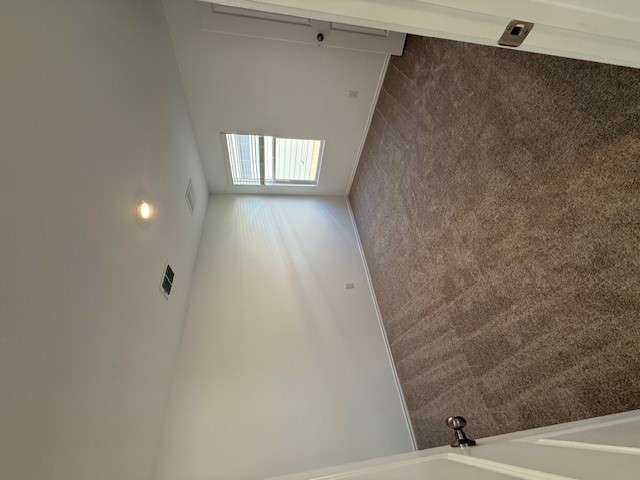 216 Sormonne Loop Kyle, TX 78640 - Photo 11 of 29 an empty room with a empty space and windows