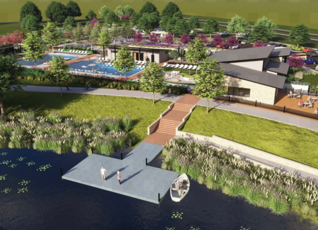 216 Sormonne Loop Kyle, TX 78640 - Photo 27 of 29 an aerial view of a house with a garden and lake view