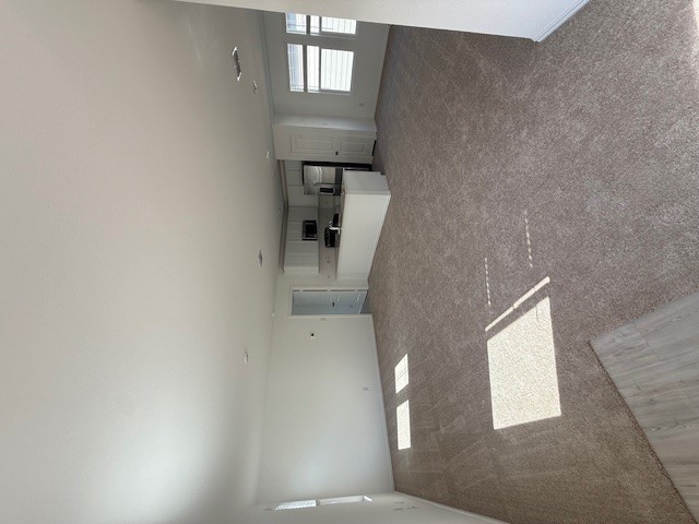 216 Sormonne Loop Kyle, TX 78640 - Photo 9 of 29 an empty room with windows and closet