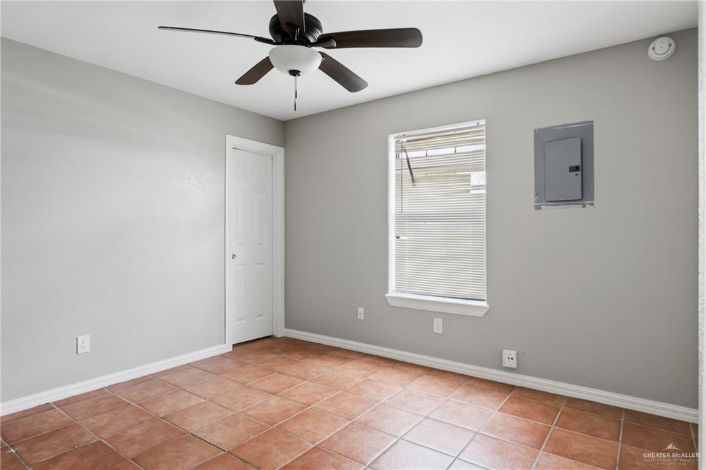 1918 Angus Street, Unit 2 Mission, TX 78572 - Photo 3 of 18 a view of an empty room with a window