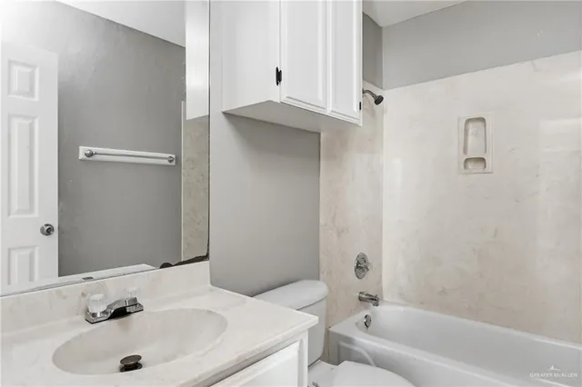 a bathroom with a sink and a bathtub