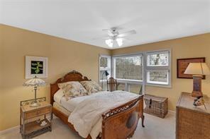 369 Maple Lane Canonsburg, PA 15317 - Photo 31 of 49 a bedroom with a bed and a chandelier