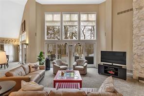 369 Maple Lane Canonsburg, PA 15317 - Photo 7 of 49 a living room with furniture a flat screen tv and a large window