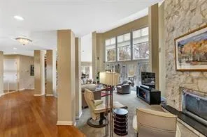 a view of a livingroom with furniture and a fireplace