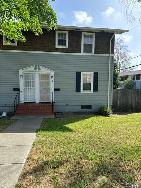 a backyard of a house with lots of green space