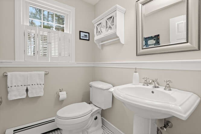3 Summit Road Southborough, MA 01772 - Photo 13 of 41 a bathroom with a toilet a sink and a window