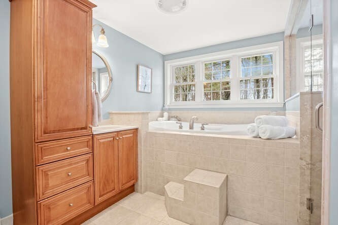 3 Summit Road Southborough, MA 01772 - Photo 16 of 41 a bathroom with a sink a vanity and a mirror
