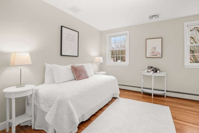 3 Summit Road Southborough, MA 01772 - Photo 19 of 41 a bedroom with a bed and a table in it with window