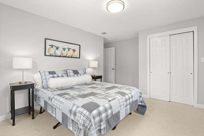 3 Summit Road Southborough, MA 01772 - Photo 23 of 41 a bedroom with a bed and a lamp