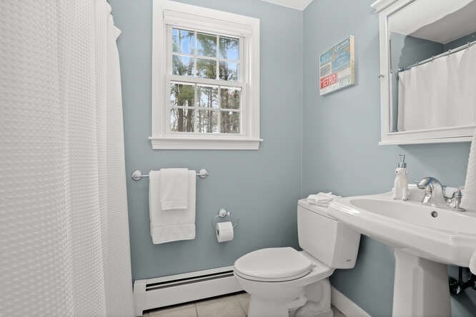 3 Summit Road Southborough, MA 01772 - Photo 28 of 41 a bathroom with a sink a toilet and a window