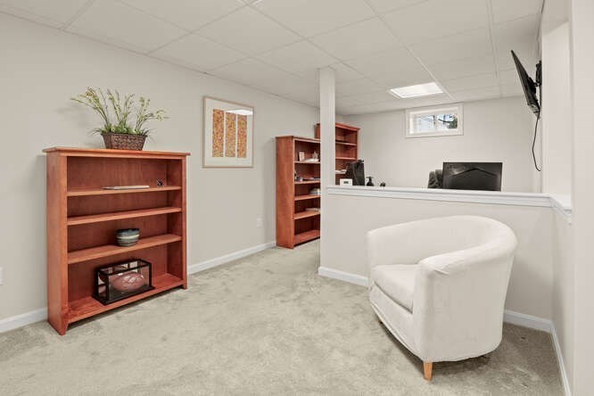 3 Summit Road Southborough, MA 01772 - Photo 30 of 41 a living room with furniture and a flat screen tv