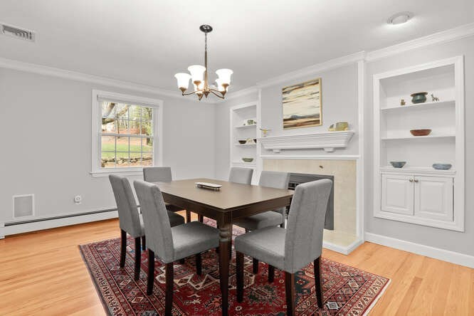 3 Summit Road Southborough, MA 01772 - Photo 5 of 41 a view of a dining room with furniture wooden floor and chandelier