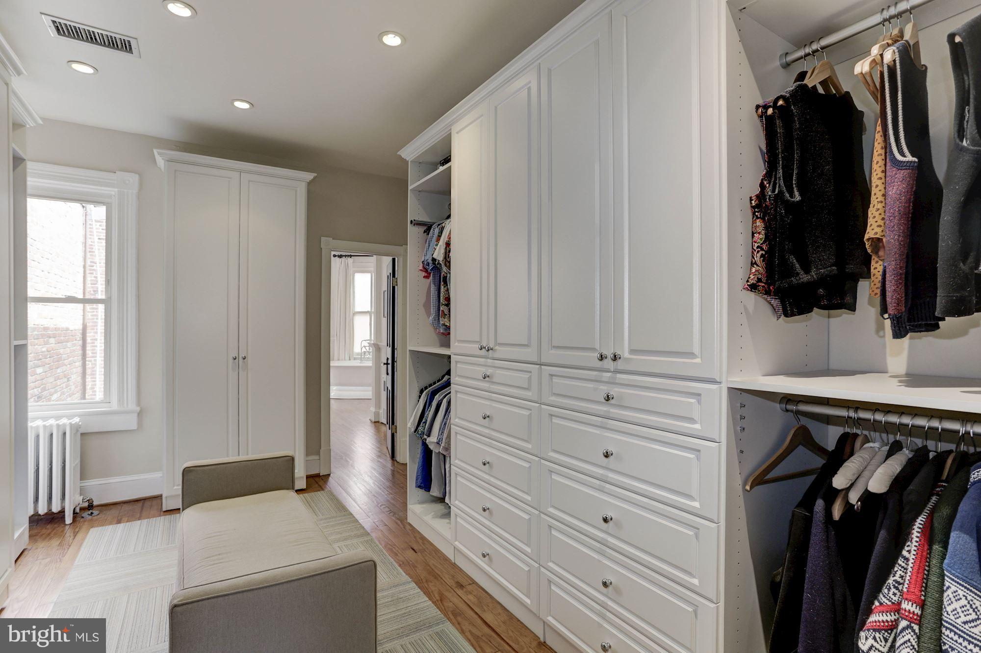 1615 21st Street Northwest Washington, DC 20009 - Photo 20 of 30 a view of walk in closet with clothes and shoes