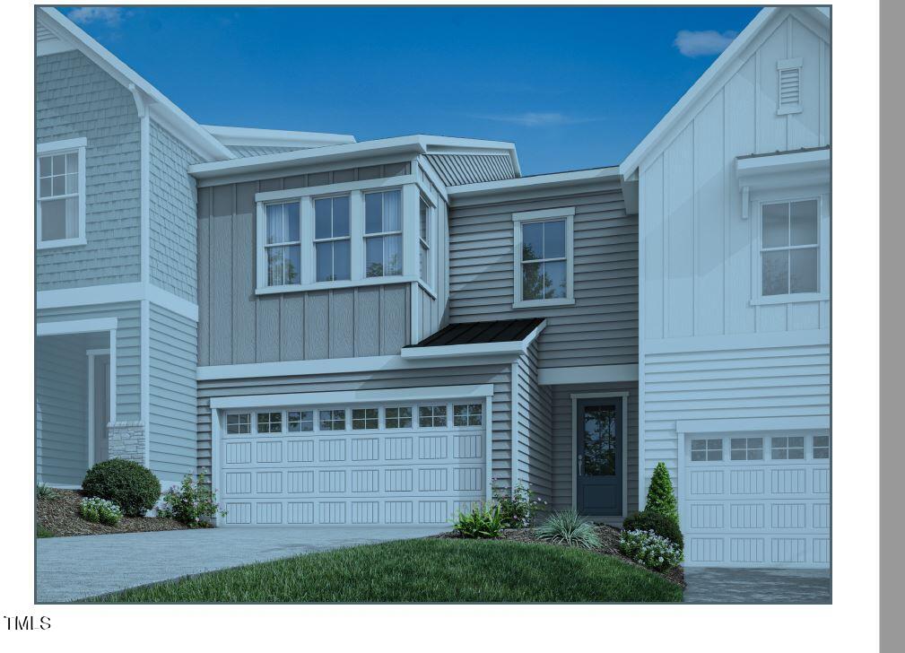 6110 Adecor Way Raleigh, NC 27617 - Photo 1 of 31 a front view of a house with a garden