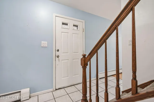 a view of an entryway with staircase
