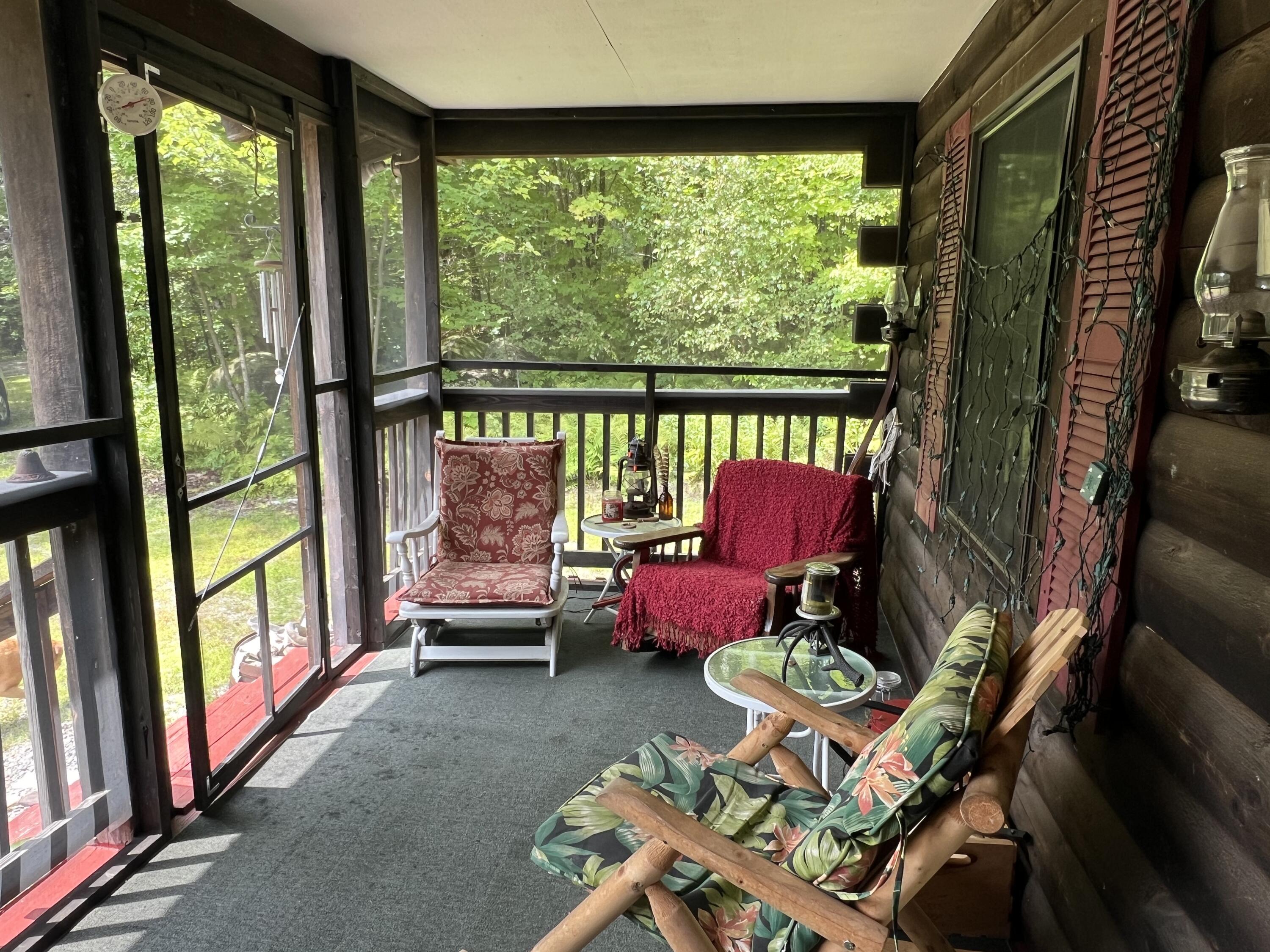 811 Bog Road New Portland, ME 04961 - Photo 2 of 32 Screened porch