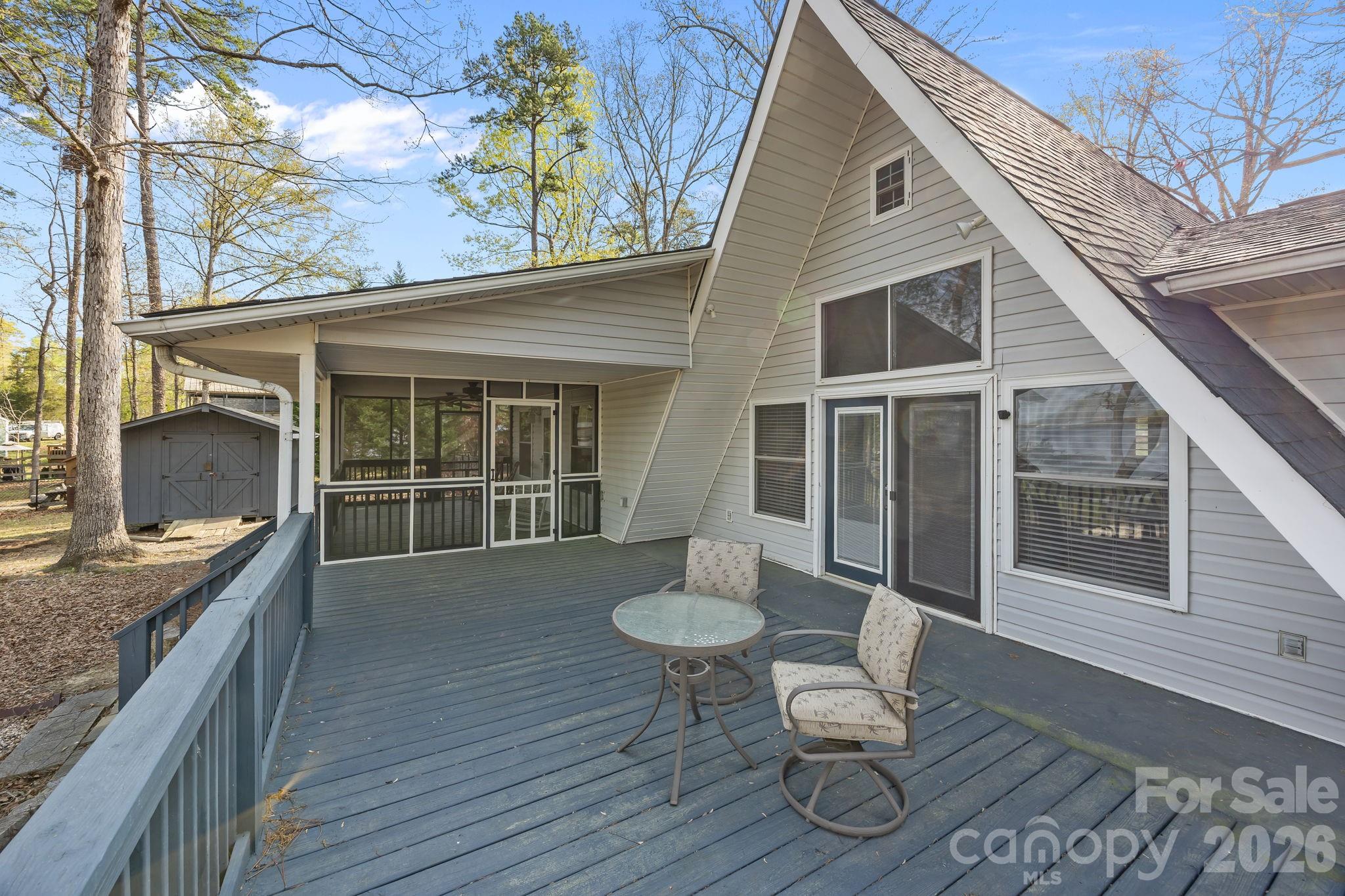 1870 Scout Road Salisbury, NC 28146 - Photo 28 of 48 a view of a patio with table and chairs and wooden floor