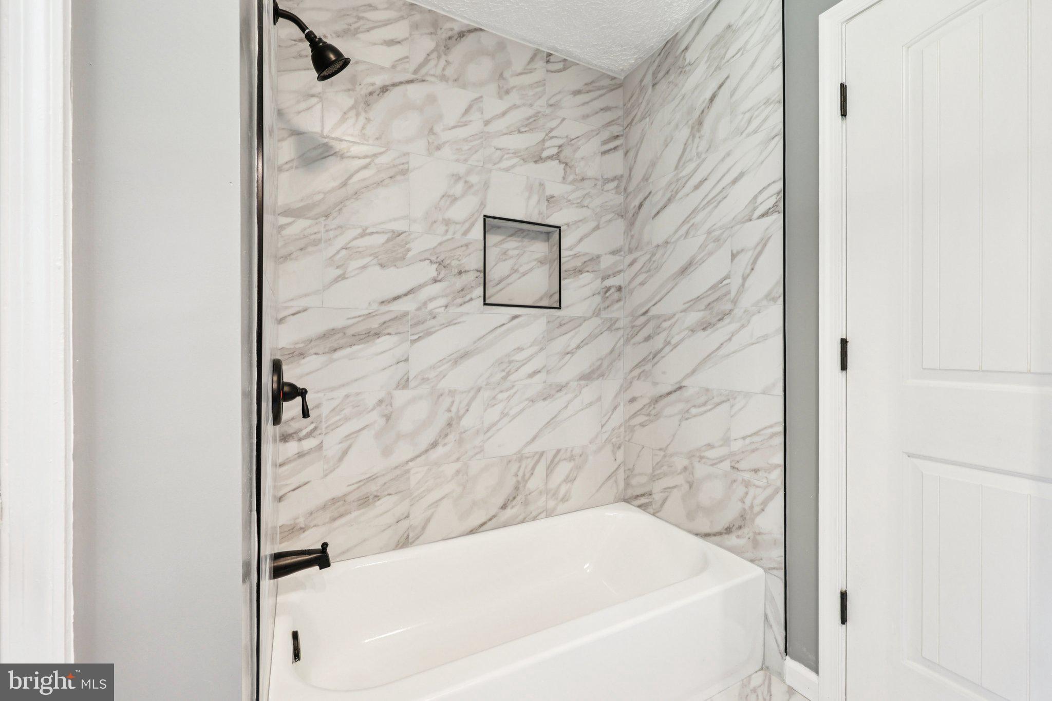 8159 Settle School Road Rixeyville, VA 22737 - Photo 14 of 16 a bathroom with a bathtub