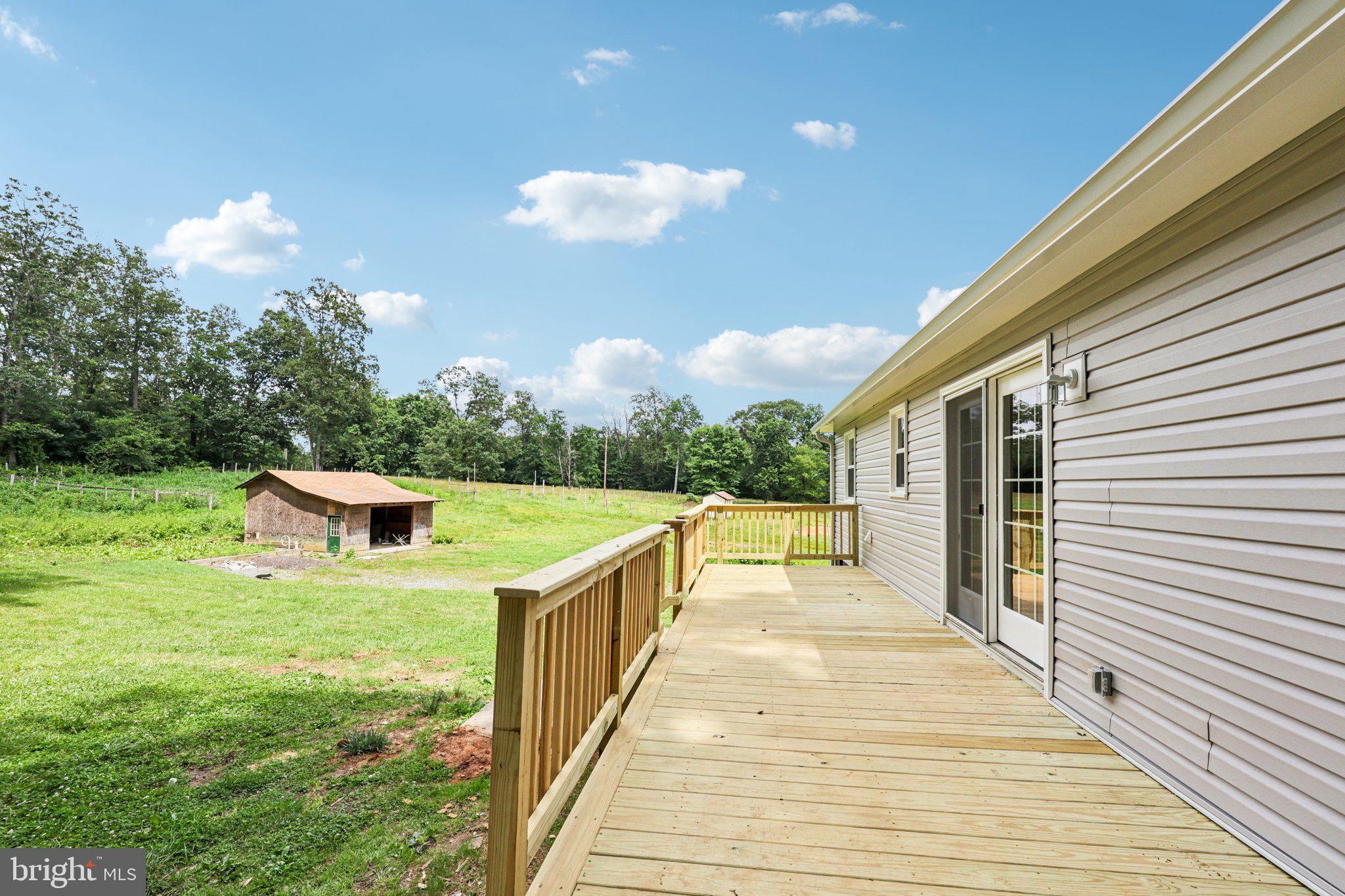 8159 Settle School Road Rixeyville, VA 22737 - Photo 4 of 16 a view of a swimming pool with a patio