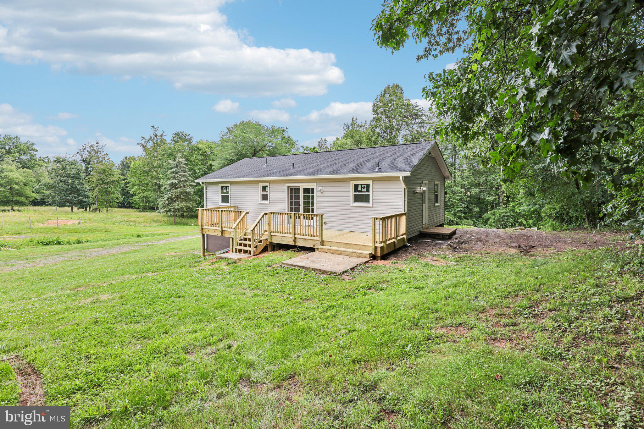 8159 Settle School Road Rixeyville, VA 22737 - Photo 7 of 16 a view of a house with a yard