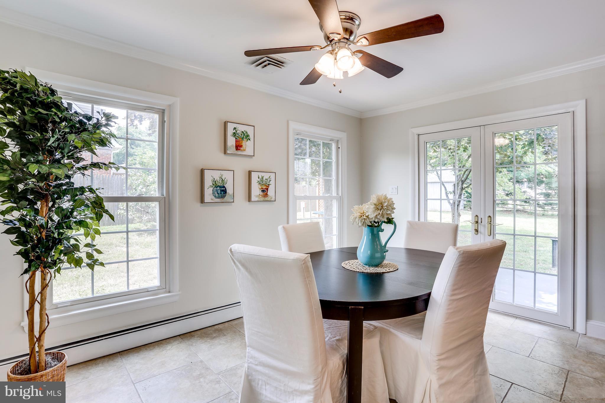 15407 Rowland Lane Silver Spring, MD 20905 - Photo 14 of 29 a view of a dining room with furniture window and outside view