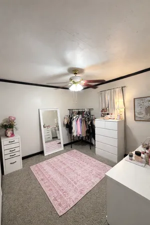 a bedroom with a bed and closet