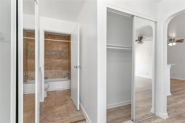 a bathroom with a glass shower door