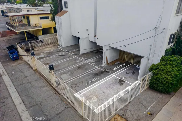 a stove top oven sitting inside of a kitchen