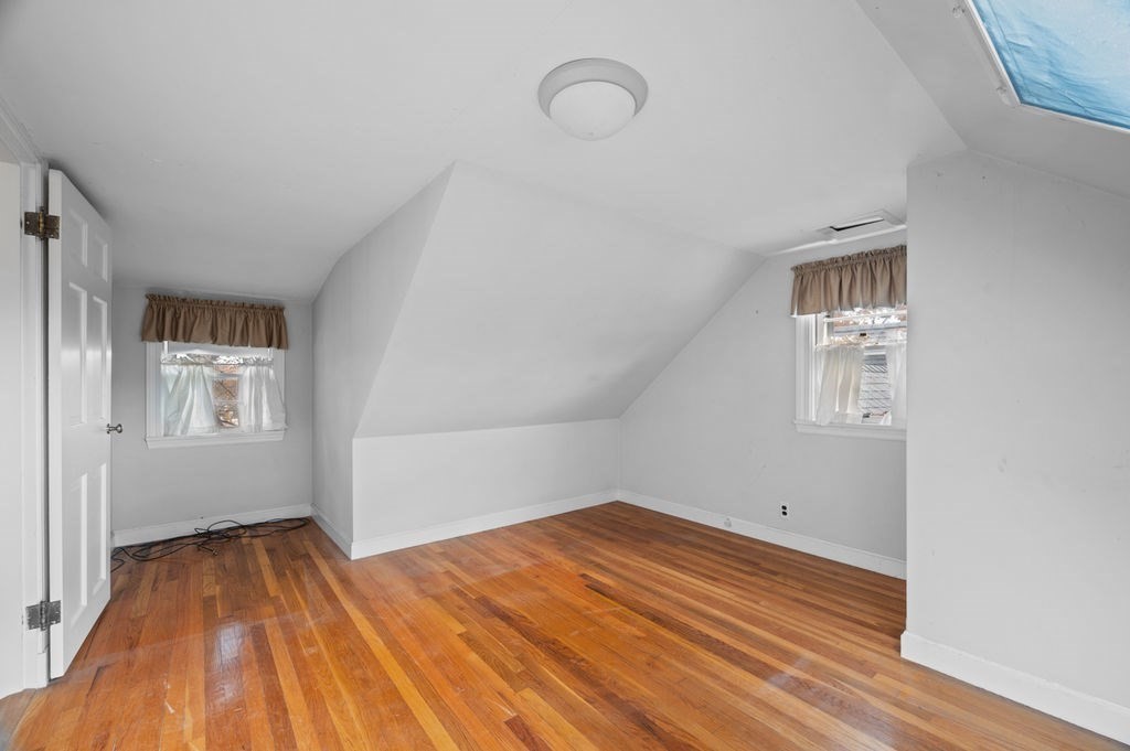 10 Standish Way Lynn, MA 01904 - Photo 25 of 41 a view of empty room with wooden floor and fan