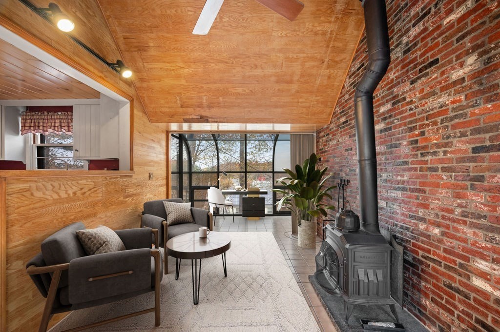 10 Standish Way Lynn, MA 01904 - Photo 8 of 41 a building outdoor space with patio furniture and potted plants