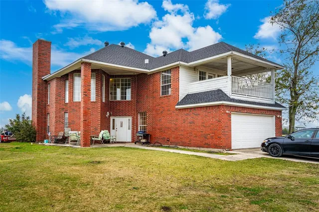 a front view of house with yard
