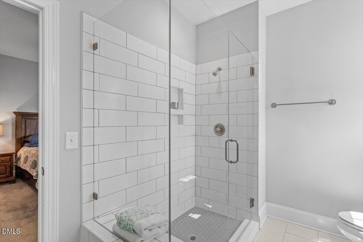 1601 Bowery Drive Raleigh, NC 27607 - Photo 12 of 41 a bathroom with a shower