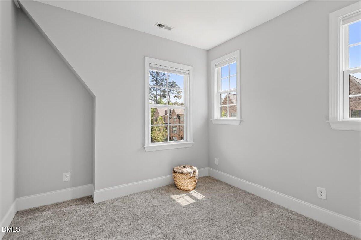 1601 Bowery Drive Raleigh, NC 27607 - Photo 21 of 41 an empty room with a window