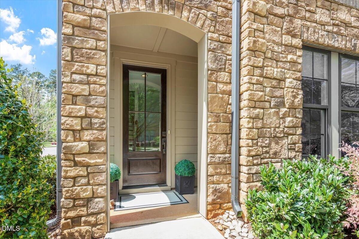 1601 Bowery Drive Raleigh, NC 27607 - Photo 3 of 41 a front view of a house with a garden