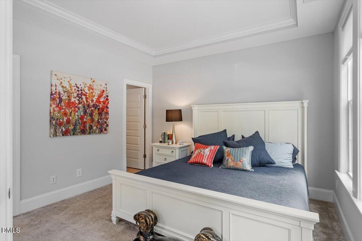 1601 Bowery Drive Raleigh, NC 27607 - Photo 6 of 41 a bed room with a bed and a couch