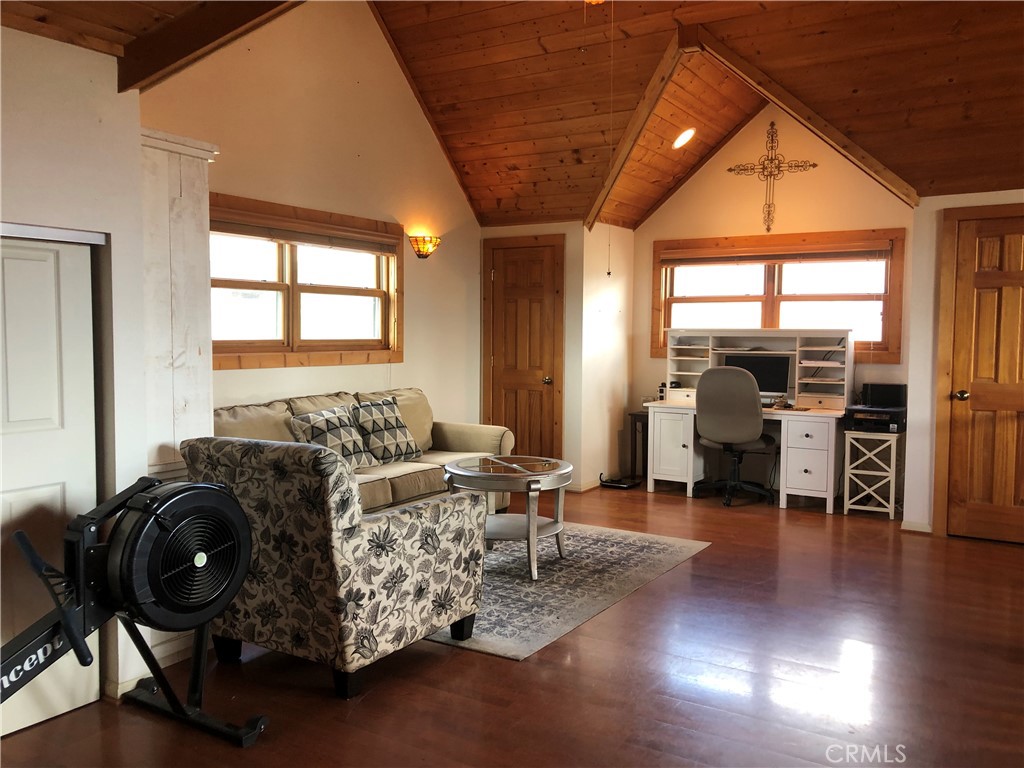 28147 North Lake Wohlford Road Valley Center, CA 92082 - Photo 12 of 26 a living room with furniture and a large window