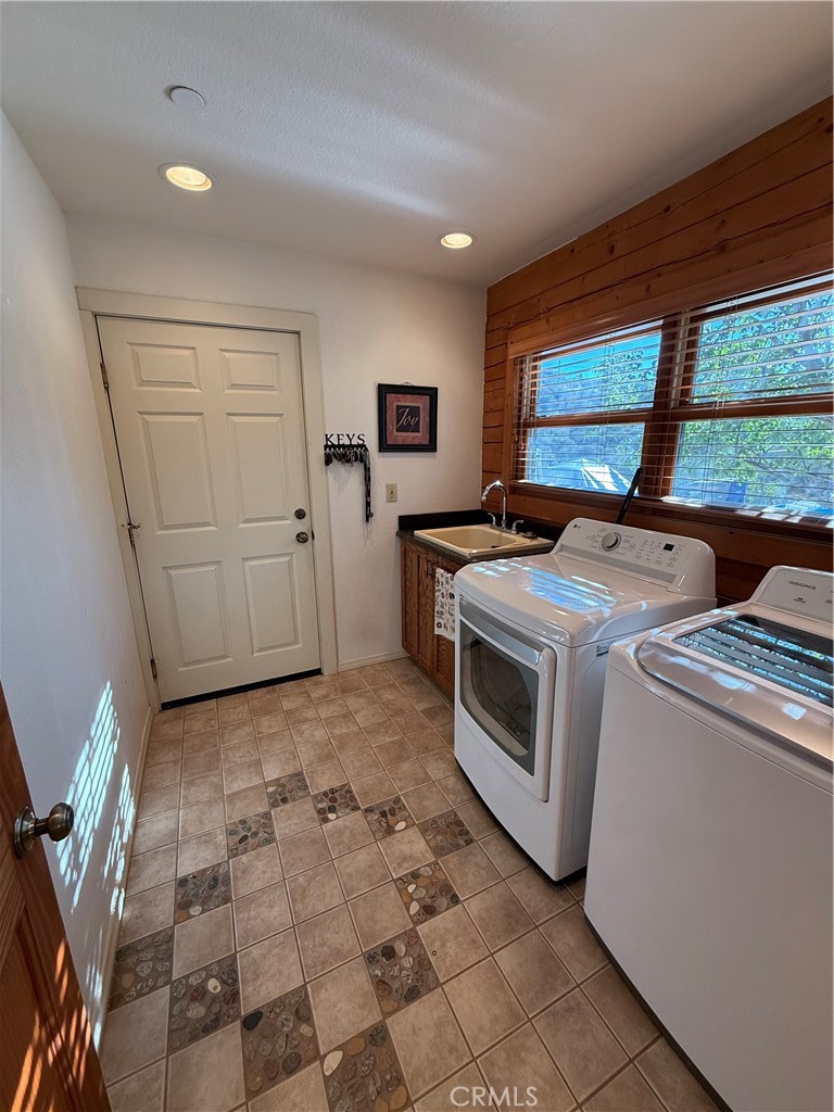 28147 North Lake Wohlford Road Valley Center, CA 92082 - Photo 17 of 26 a utility room with dryer and washer