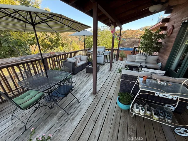 a view of a swimming pool with a yard