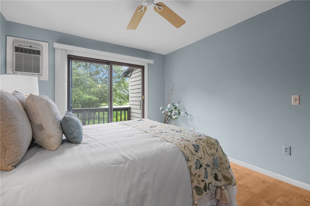180 Fishing Cove Road North Kingstown, RI 02852 - Photo 20 of 36 Bedroom with access to private deck overlooking water