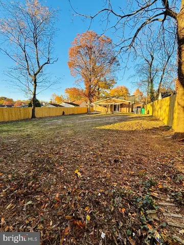 a view of a yard in front of a house