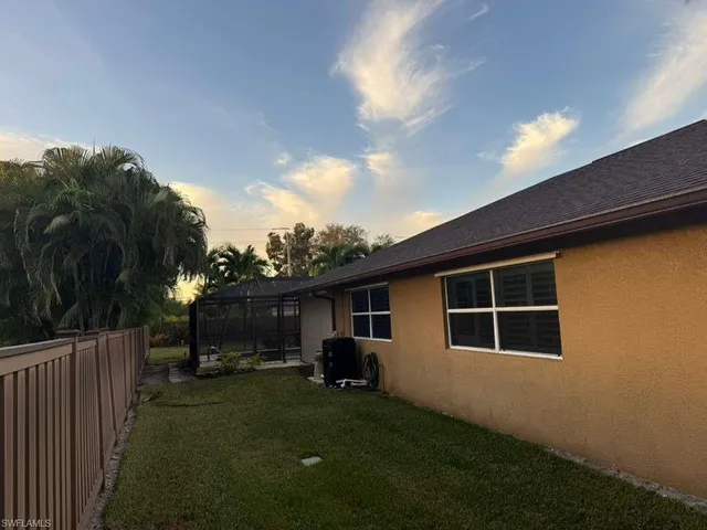 a house view with a garden space