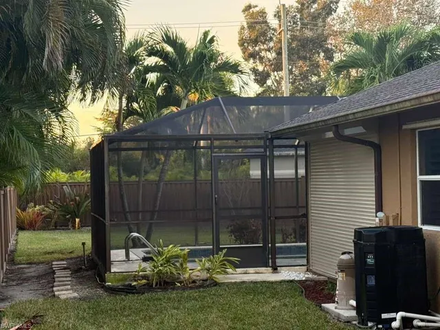 a view of a back yard of the house