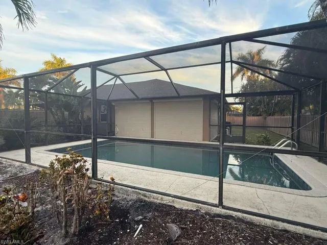a view of a glass door of the house